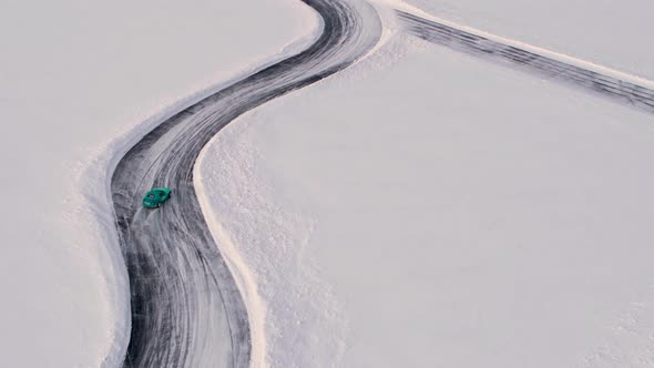 Aerial view of a racing car at an ice rally