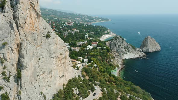 Aerial Fly Above Mountain Koshka of Simeiz with Diva Rock in Background