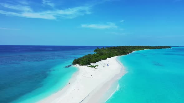 Aerial drone view panorama of tranquil lagoon beach holiday by transparent ocean and white sandy bac
