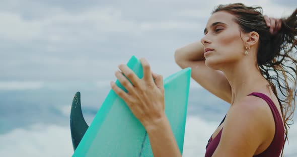 Young Woman Going Surfing