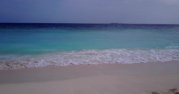 Natural above copy space shot of a sunshine white sandy paradise beach and blue ocean background in 