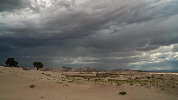 Summer monsoon moving over the desert at Little Sahara in Utah