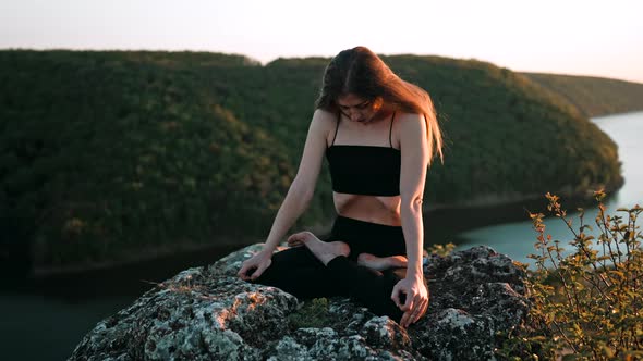 Young Woman Doing Yoga Belly Exercise  Kapalabhati Yogic Breathing Technique