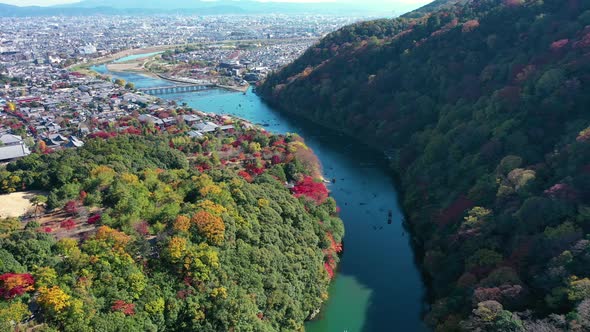 Katsura river at autumn and boats. Arashiyama, Kyoto, Japan
