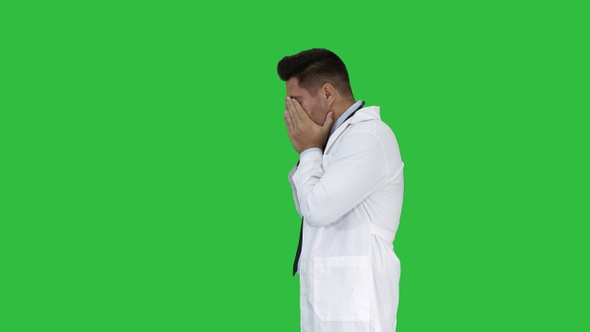 Tired Doctor Passing by On a Green Screen, Chroma Key