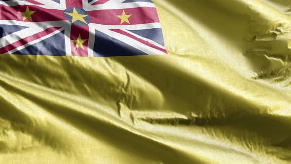 Niue textile flag waving on the wind. 10 seconds loop.