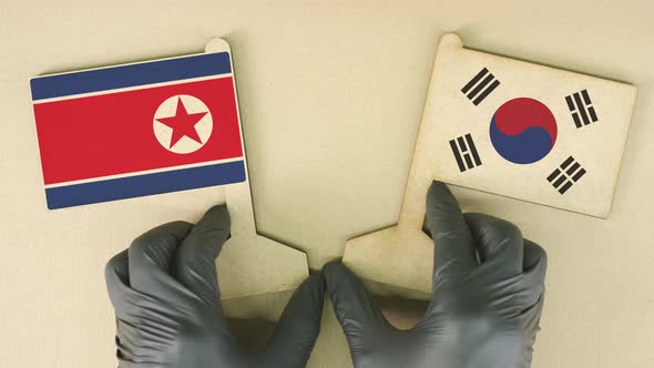 Flags of North Korea and South Korea Made of Paper