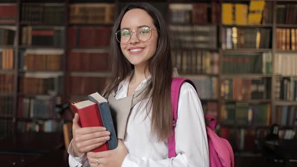 Student Smiling in Library