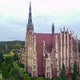 Aerial view over The Church in the agro-town Gervyaty, Grodno region, Belarus. - VideoHive Item for Sale