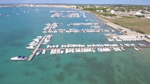 Beautiful tourist port aerial view with emerald water