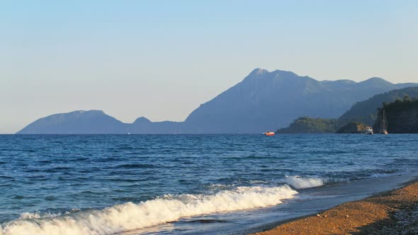 Mediterranean Coast of Turkey, Boats and Ships Are Floating Near Shore, Mountains on a Cape