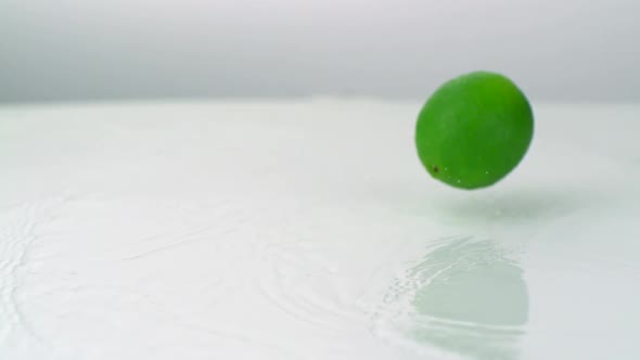Slo-motion limes falling alt
