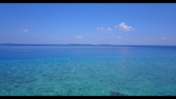 Aerial travel of tropical lagoon beach vacation by clear ocean with white sand background of adventu