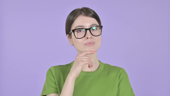 Thoughtful Woman Thinking About Something on Pink Background