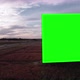 Aerial Drone Footage of Big Billboard with Green Screen near Busy Highway or Motorway at Sunset - VideoHive Item for Sale