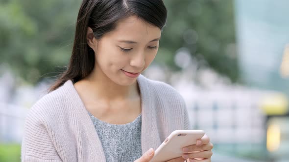 Young Woman use of mobile phone