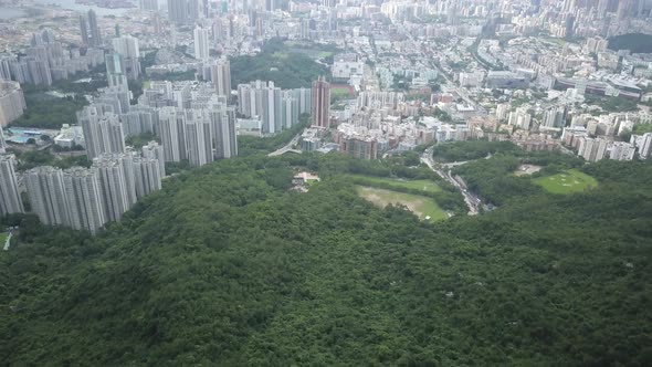 Aerial view of Hong Kong city skyline through the clouds