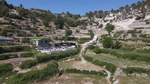 Farm House Sloping Land Aerial View