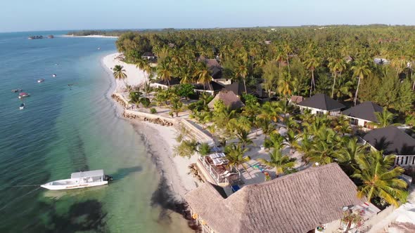 Paradise Coast Resort with Palm Trees and Hotels By Ocean Zanzibar Aerial View