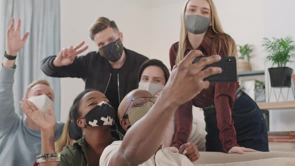 Young People in Face Masks Taking Selfie