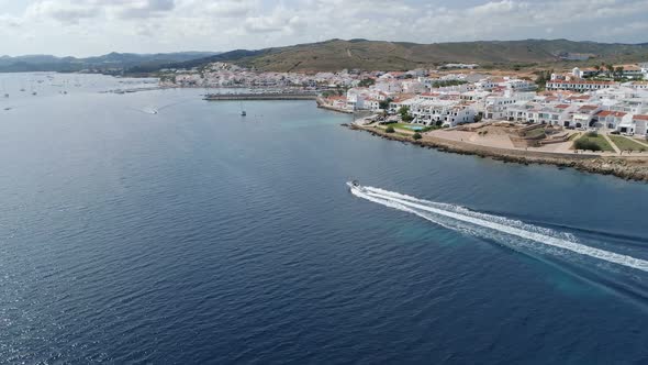 Aerial view of motorboat moving in a sea 4k