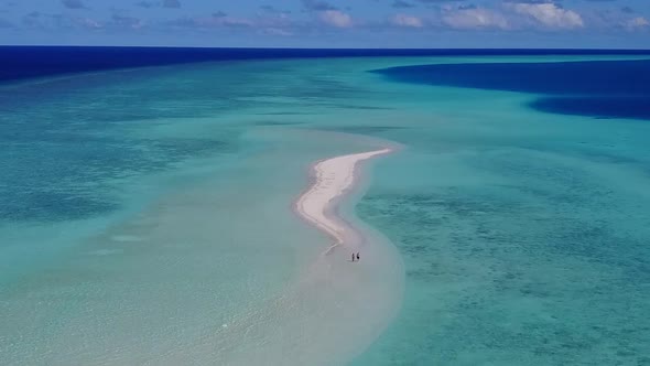 Drone view tourism of marine resort beach time by water with sand background