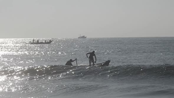 People fishing in ocean in morning, traditional boat fishing in sea. Sea fishing boat in morning.