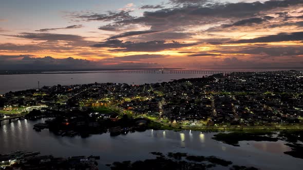 Sunset sky over downtown Manaus Brazil. Cityscape tourism landmark.