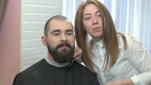 Female Barber and Her Customer