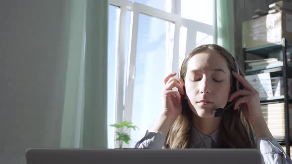 A Young Woman Starts Working in a Call Center