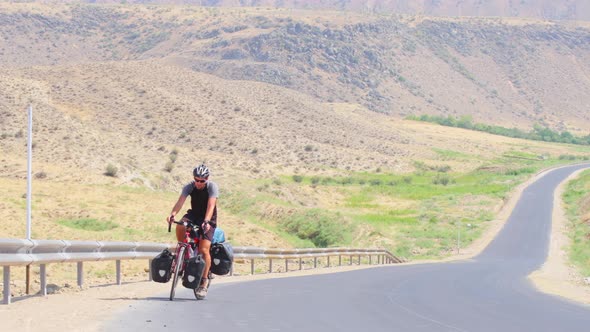 Cyclist Traveller Cycle In Mountains (Dlog)