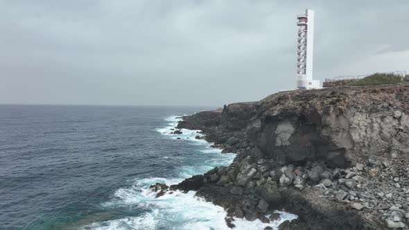 Lighthouse Look Out Tower Structure at Rocky Cliff Coast Atlantic Ocean Sea Line