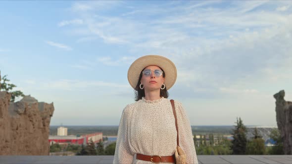 A young girl overlooking the city on the Mamayev Kurgan. Volgograd, Russia