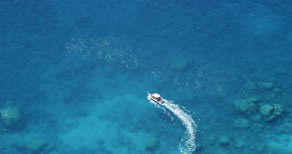 Tourist Pleasure Boats on Island Hopping Trip in Blue Sea Water