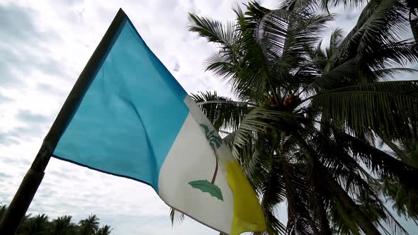 Slow motion Penang flag at rural scene 