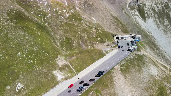Windy and Steep Grossglockner Mountain Road with Car Traffic in Summer Season