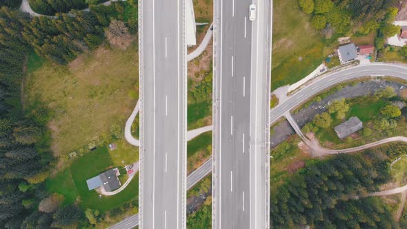 Aerial Top View of Highway Viaduct with Multilane Traffic in Mountains, Autobahn in Austria