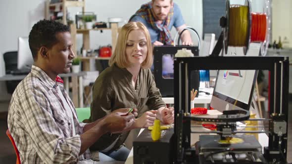 Engineers Working with FDM 3d Printer