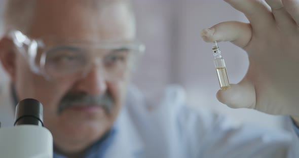 Immunization, Treatment Covid-19 Coronavirus. Close Portrait of a Male Doctor in a Protective