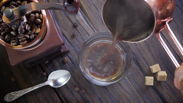 Coffee Cup with Freshly Brewed Coffee on An Old Vintage Table