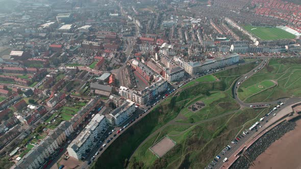 Aerial view above Scarborough North bay houses on Yorkshire small town seaside holiday resort