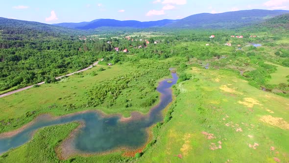 Aerial view of Jesenica river and surrounding in Croatian region Lika.