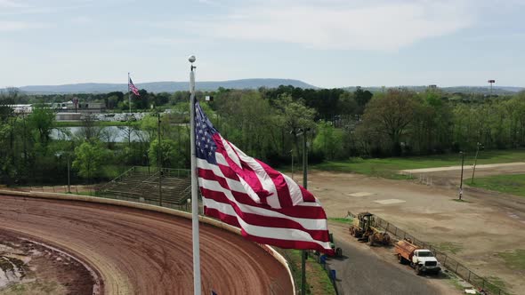 American Flag Stock Video Footage - American Flag Hanging On Pole In The Middle Of A Field