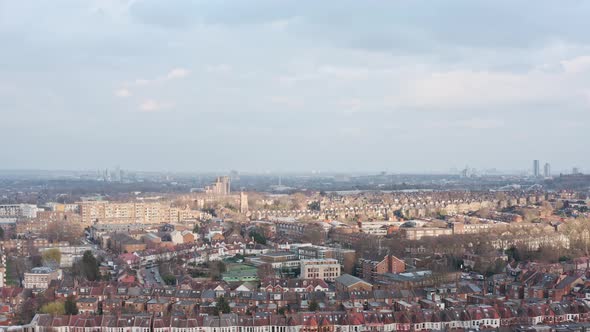 Dolly forward drone shot over suburban north London near alexandra palace