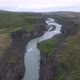 Aerial Flight over A rocky river valley in Iceland - VideoHive Item for Sale