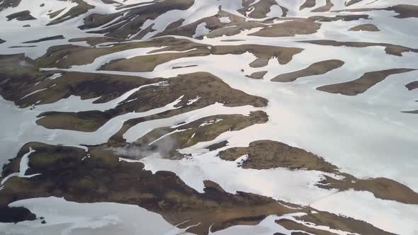 Aerial View of Snowy Volcanic Mountains in Iceland