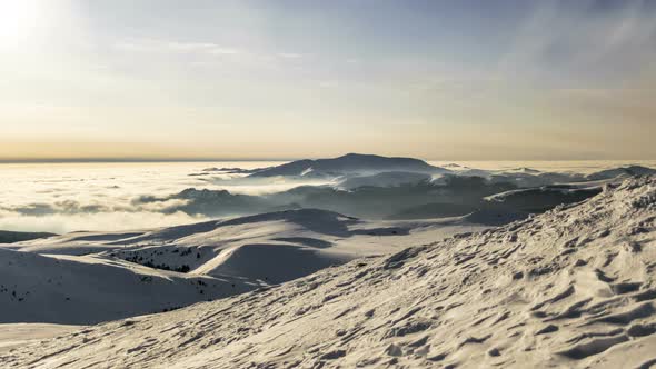 Peaks Of Mountains Above The Clouds