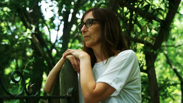 Mature woman standing in the park