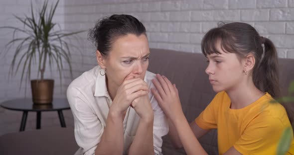 Loving Daughter with Sad Mother