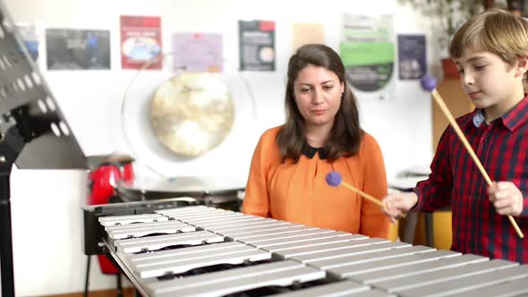 Kid Studying Percussion Instrument